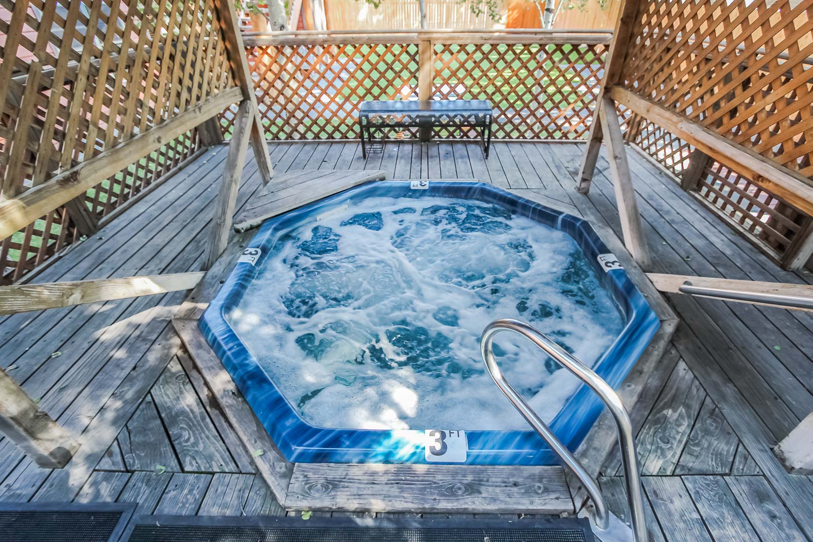 A relaxing outdoor Jacuzzi tub at VRI's Jackson Pines in Wyoming.